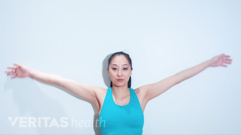 A therapist showing backburn exercise.