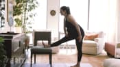 Pregnant women doing hamstring stretch