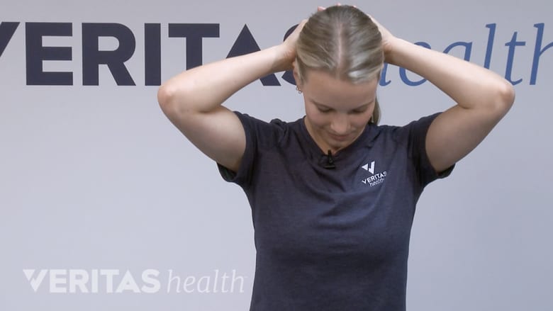 McKenzie method neck exercise neck flexion in sitting.