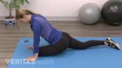 Woman doing a 4 point piriformis stretch