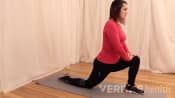 Woman doing a Kneeling Hip Flexor Stretch