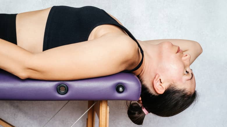 McKenzie method neck exercise neck extension in lying.
