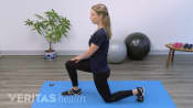 Woman doing a lunge.