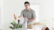 Physical therapist working with a patient's knee
