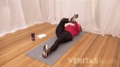 Woman doing a Supine Piriformis Muscle Stretch