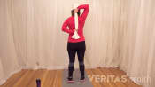 Woman doing a towel shoulder stretch