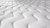 Closeup of a plush mattress