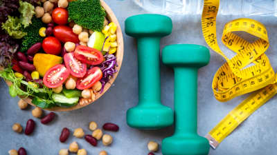 Salad, hand weights, and tape measure.