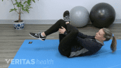 Woman doing a hamstring stretch