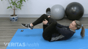 Woman doing a hamstring stretch
