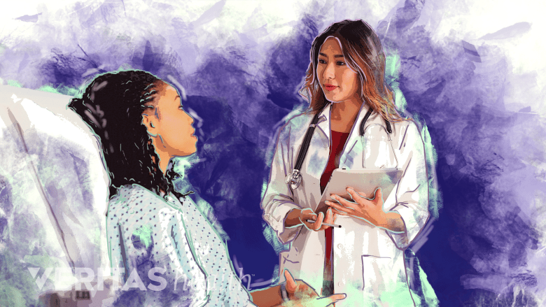 A doctor recording medical history of a patient.