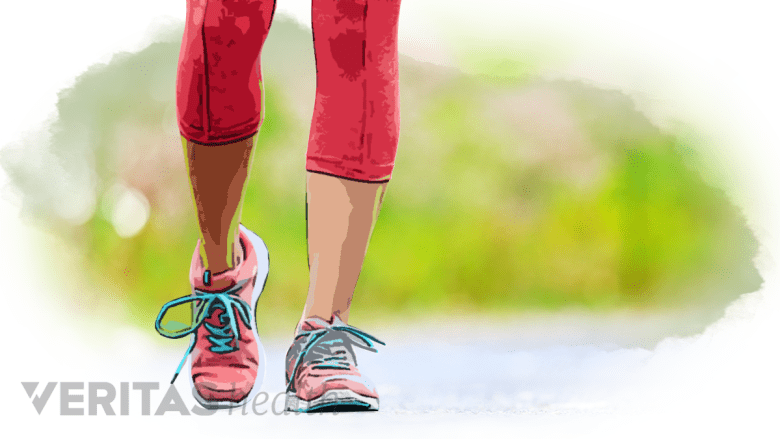 A woman walking on the trail.